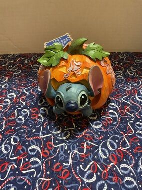 Jim Shore Blue Stitch Pumpkin Figurine with Orange and Green Accents